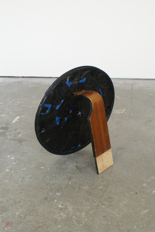 Wood, bicycle wheel, tape