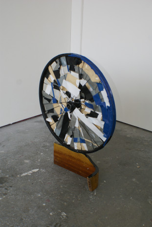 Wood, bicycle wheel, tape